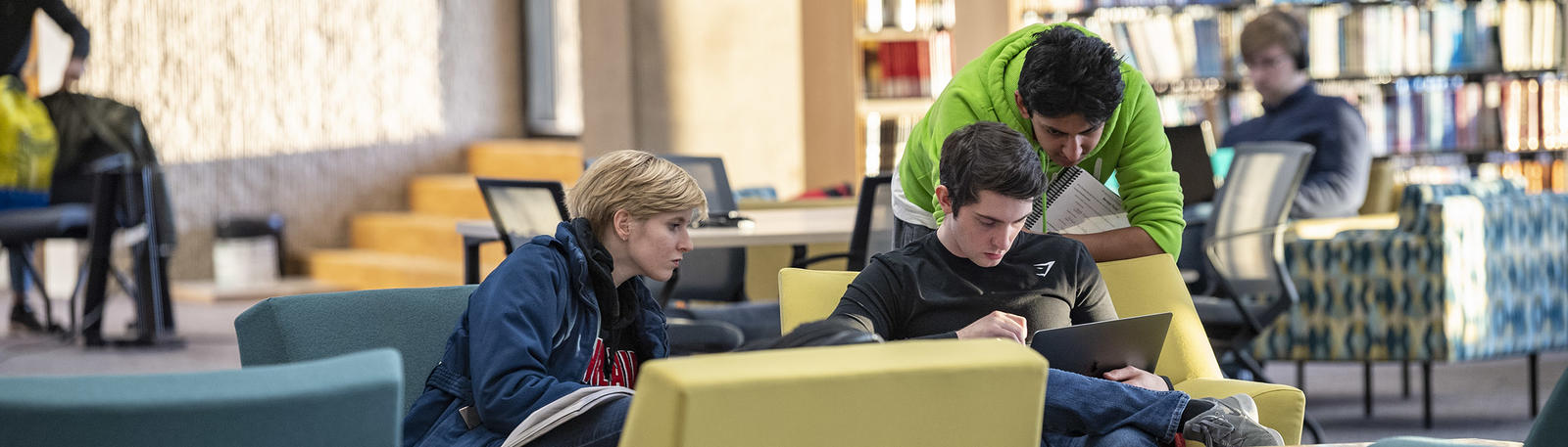 photo of students sitting in the library