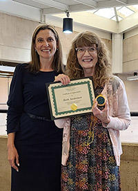 Image of Mandy Shannon, Associate University Librarian; Beth Anderson, Information Desk Evening Supervisor