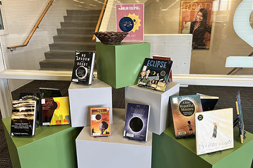 Photo of library book display for the solar eclipse