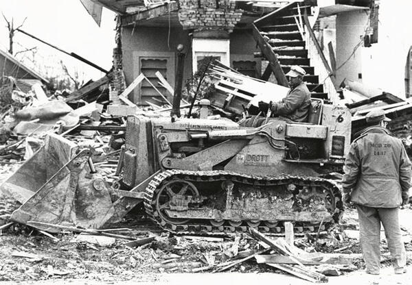 A bulldozer amid the aftermath of the Xenia tornado.