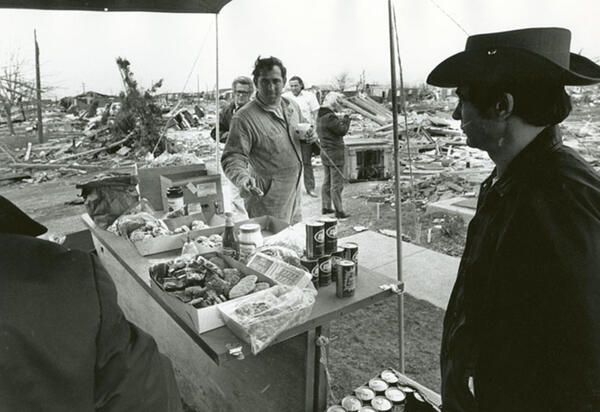 Small table of food and drink for workers cleaning up in the aftermath of the Xenia tornado.