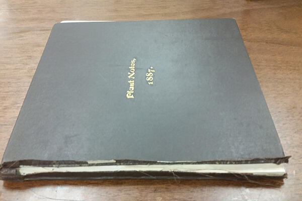 Orville Wright's Botany Sketch book in closed position before treatment, showing separated cover