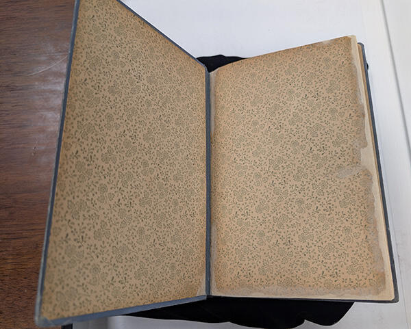 An open, repaired book.