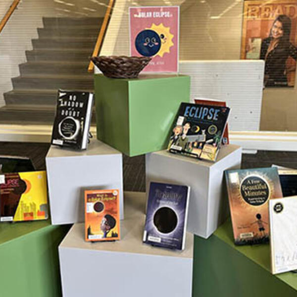 Photo of library book display for the solar eclipse