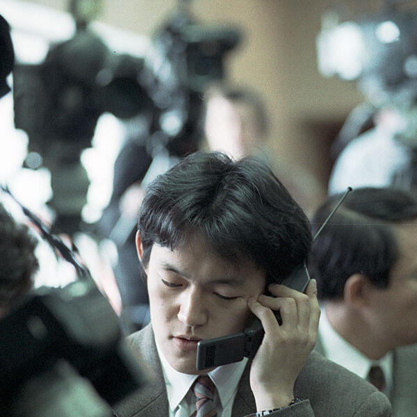 A man talking on his cell phone.