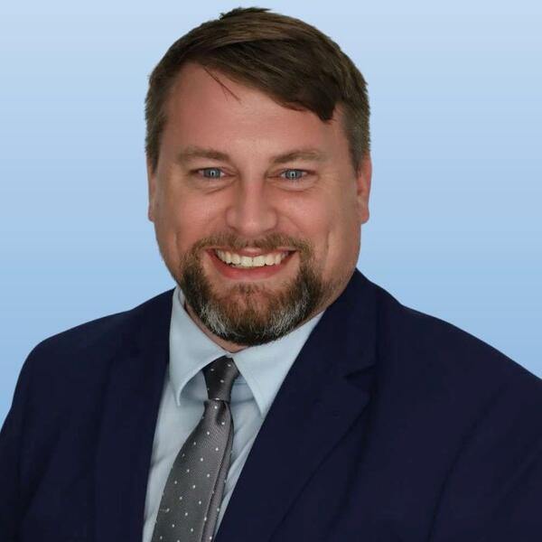 Professional headshot of Zachary Adams-Willis