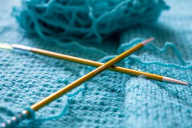 Knitting needles and yarn