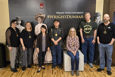 Image of library staff receiving years of service recognition