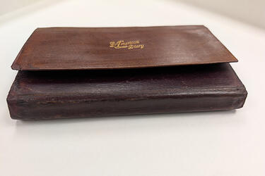 Bishop Milton Wright's 1903 Diary in closed position after conservation treatment with repairs at folds.