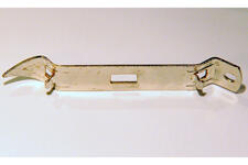 A close-up image of a metal church-key bottle and can opening tool. The tool has one triangular, sharp end and one hooked,  squared end. 